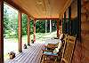 The covered petty coat porch style deck is perrr-fect for relaxing after a great day's worth of White Mountain fun.  Be it fishing, hiking, biking or boating... no matter your pleasure "Izzy's Place" is a true treasure.  Book your time today, Call 800.247.5536.