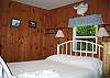 The white furry fellow on the wall.... his name is Moosie and he likes to welcome all the young and young at heart to the Klebenov Chalet.  This second bedroom has 2 twin beds, a deep closet and built in vanity area perfect enough for any aged princess to enjoy.
