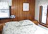 Here is a second look at the #1 bedroom in Franconia's Slalom Chalet, a Franconia Notch Vacations professionally managed rental accommodation.