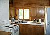 This kitchen has all that is necessary for preparing your famliy's meals and the BBQ Grill is just out the door for all you grill enthusiasts.