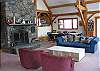 It took 4 photos to get to where we could first show you the grand central fireplace of The Round Mountain Lodge.  The woodshed outside is fully stocked and a cracking fire awaits your crafting.  The Family will love it!