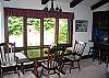 The Living and Dining areas of the High Hillside chalet run together rather nicely with yet still more windows.  Outside of these windows you are sure to enjoy watching the Hummingbirds that visit with regularity.  They are what we like to consider our "White Mountain Fairys".