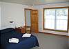 This ground floor access bedroom is just perfect for folks looking to avoid stairs or long walks to a bathroom.  A private bath is attached.