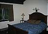 Featuring a queen size bed, private sliding glass door to a small deck and a full size bathroom just outside of it's door, the master bedroom is perfect for the King & Queen of this accommodation.