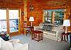 Here's another angle or take on the living room layout. They will be no fishing for light here, yet there is plenty of angling for fish available on the lake.