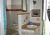 What you can not see here is that the tub is the deep Jetted Jacuzzi style.  An enjoyable bubble bath awaits you.....