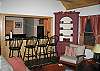 This photo was taken while standing, back to the stove looking toward the kitchen-dining area of the Kinsman Valley View Mountain Retreat.