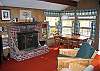 The main living dining area of the Roger's Chalet is folks as of a quaint ski or rustic mountain chalet really.  The fireplace makes for some toasty warmth when ever your hearts desire.
