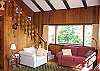 The Living Area of the Furst Haus is meant for family gathering and group togethering.  Lots of glass, 2 couches, a love seat plus a soap-stone woodstove fireplace insert offer great mountain country comfort any time of day or season.  It's Wi-Fi Equipped too!