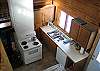 The Twin View Log Home, located less than 20 minutes from Santa's Village, offers a clean and easy kitchen, with BBQ Grill just outside the door.