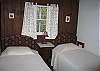 The second bedroom is nicely outfitted with 2 twin beds, that if your requirements demand, can easily be put together to make the effect of a second king size bed.  Excellent when two couples are looking to match the best of both economy and comfort.