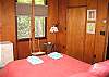 Looking at another angle of the isecond master bedroom suite. Expect queen size beds, lots of windows and a great big closet in both master suites at the Ridge Top Family Trust Vacation Rental property.