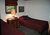 The second bedroom- one the main floor offers two good quality twin size beds.