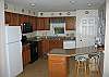 This newly remodeled kitchen features granite counter tops, a pro-style gas range with oven and everything you'll need to make some great family meals.