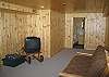 The fully finished lower level of this property features 2 large futon couches, the TV/DVD and another full bathroom.  This will be the Cool Spot in the summer months.