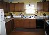 Lots of counter space, lots of cupboards, and fully equipped, this kitchen gets it done when your ready for lots of vacation fun.