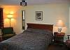 Features a Full size bed with 2 chairs for easy reading or just relaxing.  Air conditioned in summer.