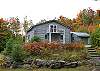 The view uipon arrival, although mostly obscured from the Jericho Road is as appears here.  During our Fall Foliage season and into NH's Hunting Season this home is ideal!