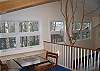 The newly expanded Klebenov Chalet includes a great "gaming loft" which includes a checkers or puzzle table and a wonderful sitting bench with tons of natural light.  Then of course there's that outstanding Franconia Notch Tree Top.