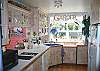 This kitchen is simply delightful, very airy and filled with light.