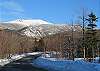 In winter months your view at the end of the driveway will appear as so, with the closest Cannon Mountain ski lift being less than .3 miles away from your door-step.  You will be able to walk to the lifts and then ski home when snow conditions permit!!