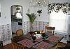 Compact yet complete, the dining table does extend to seat 8 when the need calls for it.