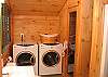 Where the second bath of the Timber Ridge Retreat features both a Full Size Sauna and Laundry Center, it is perfectly located between the second & third bedrooms yet it is also very easy to access from the Master Suite.