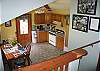 This would be looking out and down into the kitchen-dining area which is separeted from the raised living area by 6 steps. Camp U-No is a hunters heaven, hiker's hideaway and Homeaway for any visiting vacationer.