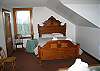 The third bedroom in The Pettyboro Place offers two indentically yet opposingly places queen size beds.