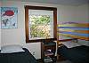 The second bedroom of the Hillary House- A Mittersill Chalet, is also located on the main floor, next to the Main Bedroom and it has a full size bath just outside of its door.