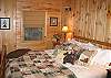 The second bedroom of Franconia's Timber Ridge Retreat features a King size bed and has been masterfully designed to provide nothing shy of a wonderful mountain retreat experience.