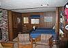 The thrid bedroom area features 2 twin beds and folding doors that close out the activities of the family den should there be need to do so.