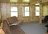 During winter months the futons in this den come in handy for the occassional over-night guest, perhaps due to a snow storm that prohibited thier safe return.  It does happen...