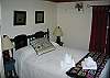 The Old Crow Cottage features one quality queen size bed as seen here.  Franconia Notch State Park and all of NH's White Mountains won't be but just a few miles away when you awake.