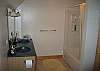 This second bathroom is shared between the 2 upper bedrooms.  The master bedroom enjoys direct access where the second bedroom has hallway access through a seperate door.