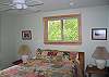 Newly re-finished, this bedroom offers the most modern comforts, such as a queen size bed, ceiling fan and recessed dimmer switched light fixtures.