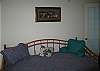 The second bedroom features a daybed with twin size trundle bed underneath it, allowing for a variable configuration of White Mountain Country style vacation rental comfort.