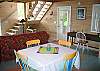 The central area of "IDRA" is all open and inlcudes the living, kitchen, dining and day-bed nook with plenty of light for both your day and evening enjoyment.