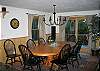 The dining table is also centrally located and well positioned with immediate access to the kitchen.  Save the table space for your enjoyment as you use all the wonderful Granite counter top area for your family style serving needs.