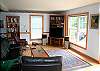 This is the full view of the living room comforts at The Cannon View House. Simple, modern and clean. A Franconia Notch Vacation is sure to be enjoyed relaxing with the views available right from the couchs.