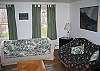 Living space has all the space you will need for a one bedroom, and the white sofa is a queen sleep sofa when times should call.
