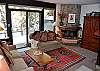 Living area with wood burning fireplace, wood provided.