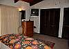 Master bedroom with King bed and TV