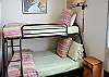 Middle bedroom with staggered bunk, double on bottom single on top