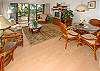 This top-floor condo has nice warm tropical tones, stylish furnishings, and laminate floors -- and as an added plus, air conditioning!