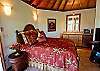 The upstairs Master Suite is complete with wet bar, ensuite full bath and views of the pond.