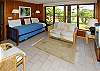 The two twin beds in the downstairs den are stored top-to-bottom. The bottom bed pulls out and pops up for use.