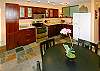 This updated kitchen was designed to open up the condo giving the feeling of lots of space.