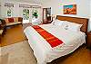 What a great bedroom! Spacious with glass on two sides and a wonderful inviting king bed.