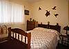 Very tidy second bedroom with Full bed.